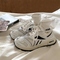 <<White [One size smaller]>>
